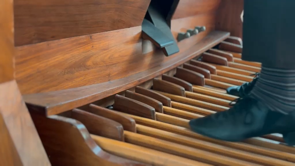 Philip's feet on the organ pedalboard